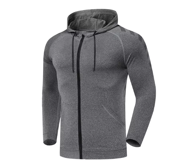 Image d'un ensemble de surv&ecirc;tement &eacute;l&eacute;gant comprenant une veste zipp&eacute;e et un pantalon assorti, con&ccedil;u pour les performances sportives et les entra&icirc;nements en salle de sport.